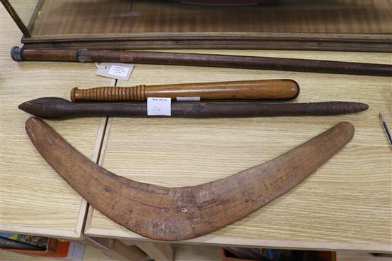 A tribal club, a boomerang and a truncheon, club length 63cm